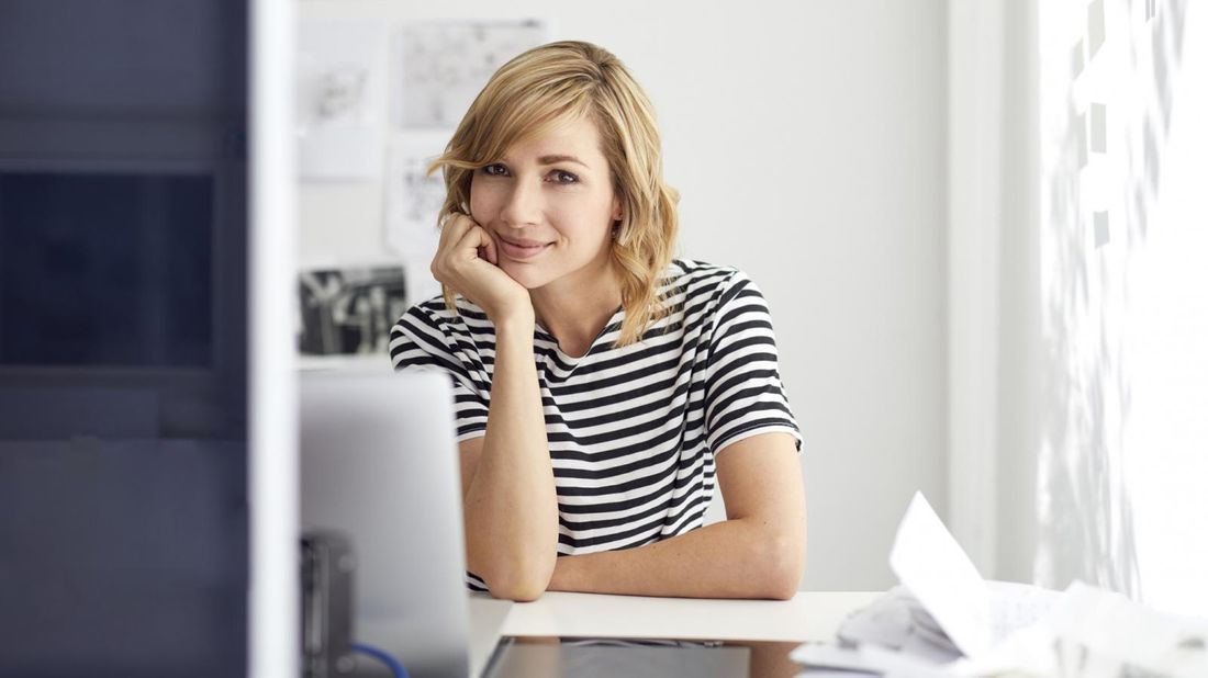 Businesswoman thinking about asking for a raise