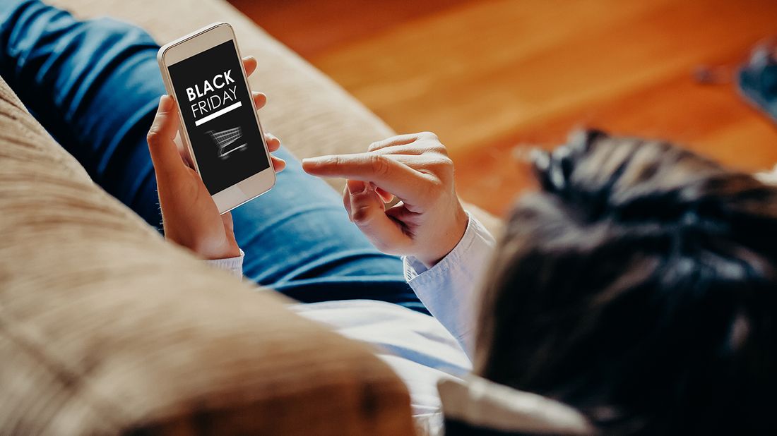 woman shopping Black Friday sale from phone