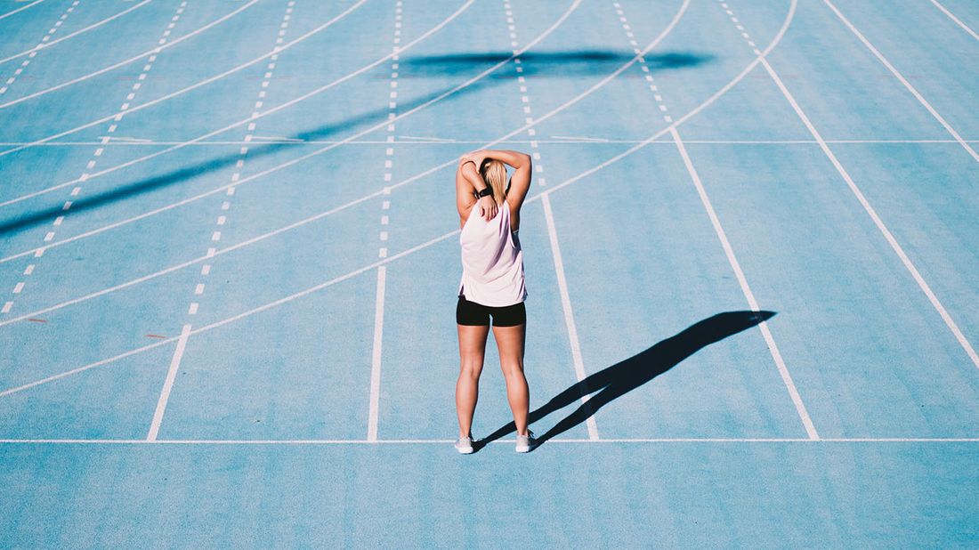 woman warming up on track