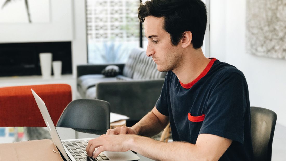 man working on laptop