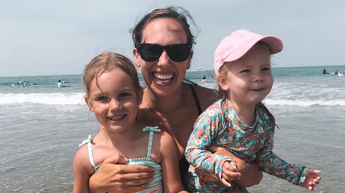 Kristin Bartlow and her daughters on the beach
