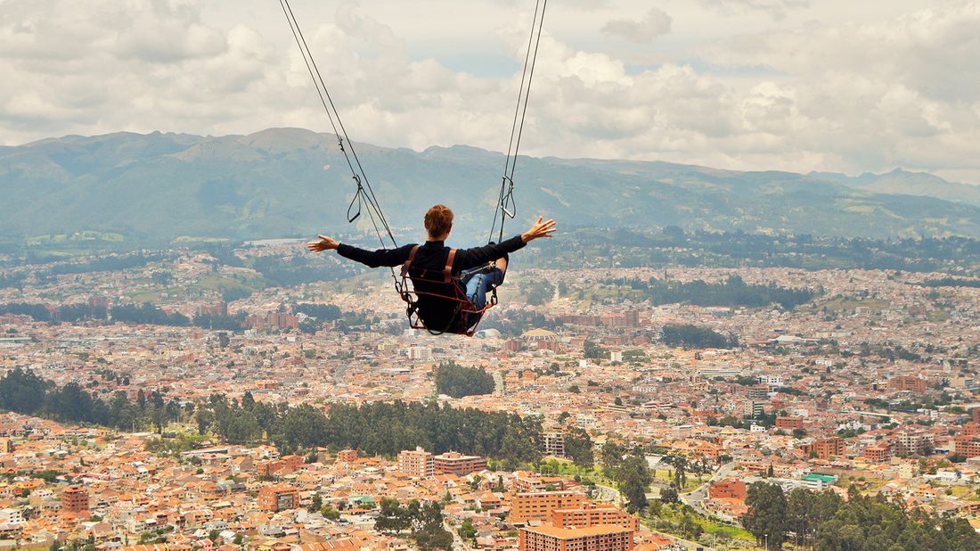 Stephanie Montague rides the giant swing in Cuenca, Ecuador.