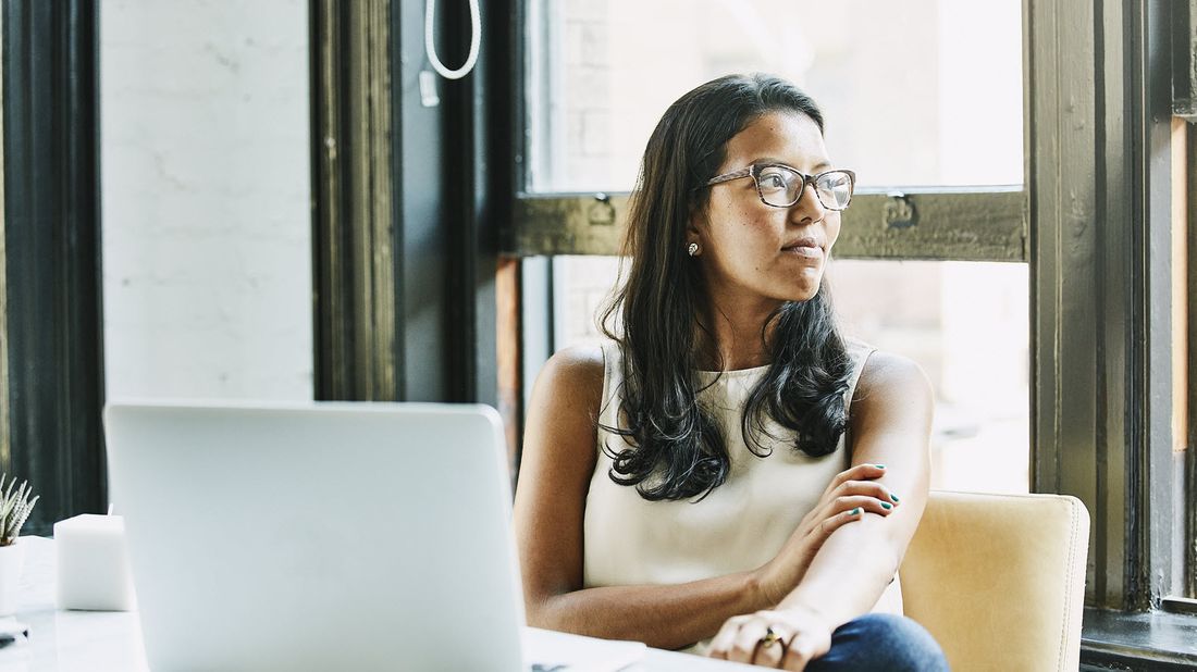 Woman sitting at desk.