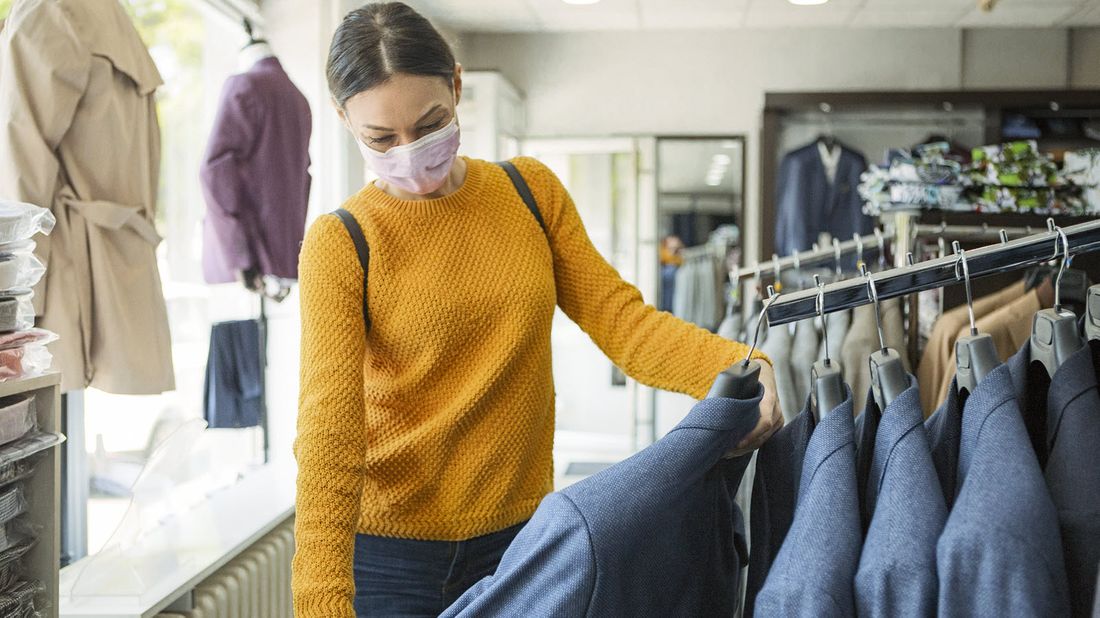 Woman wearing a face mask while shopping.