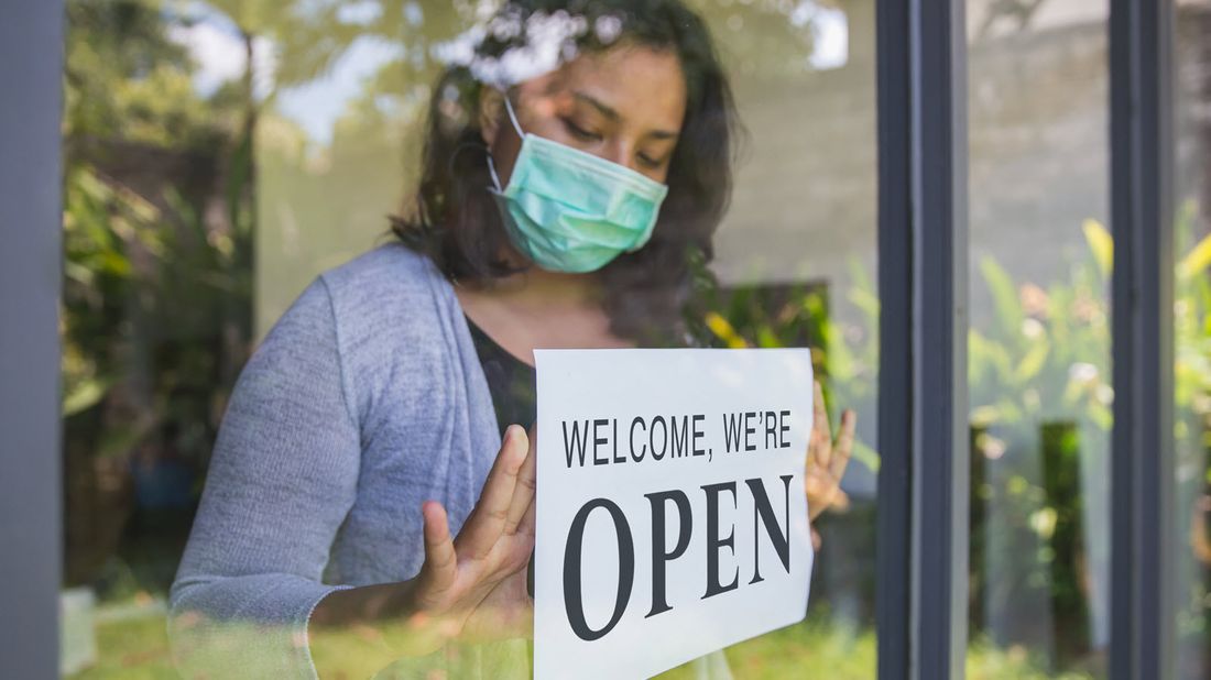 Small business owner reopening store