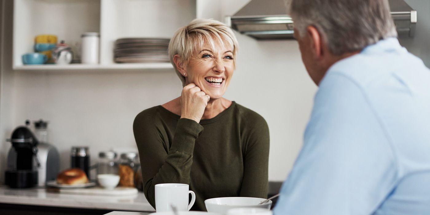 couple discussing retirement over breakfast