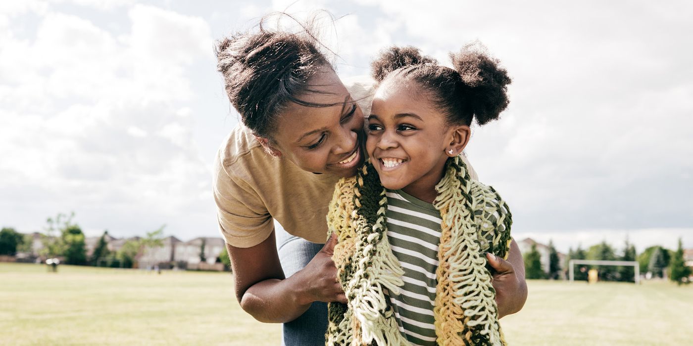 mother and daughter outside