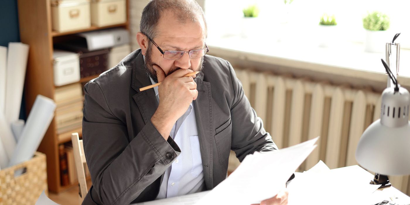 A middle-age reviews his finances