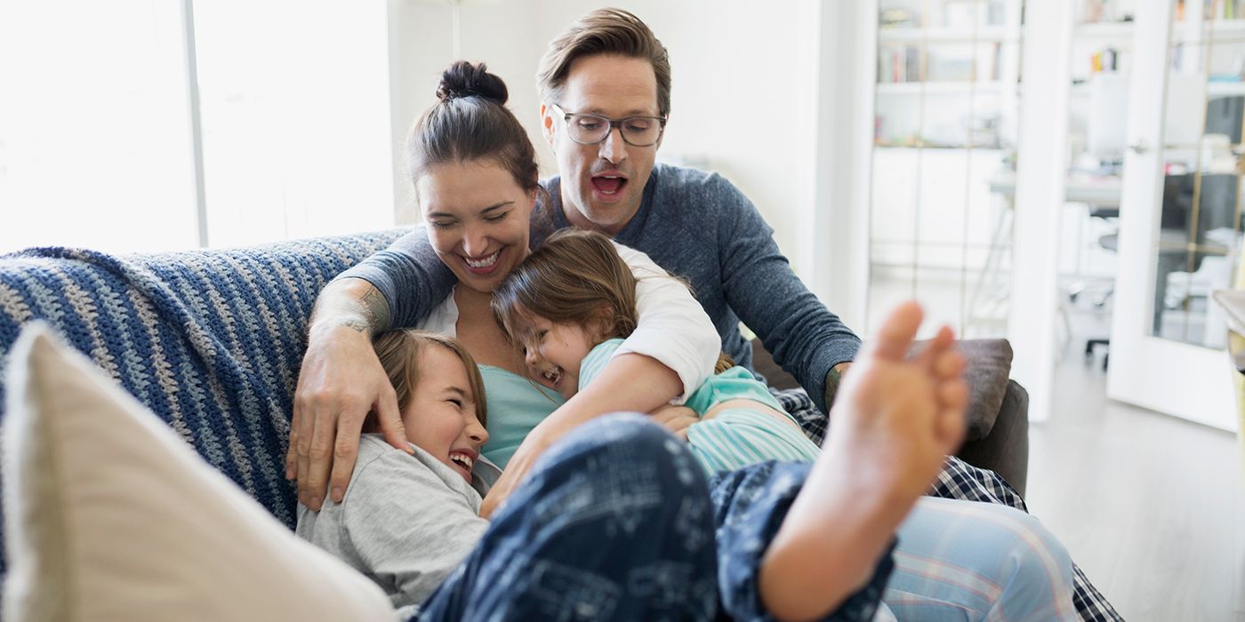 family playing on couch