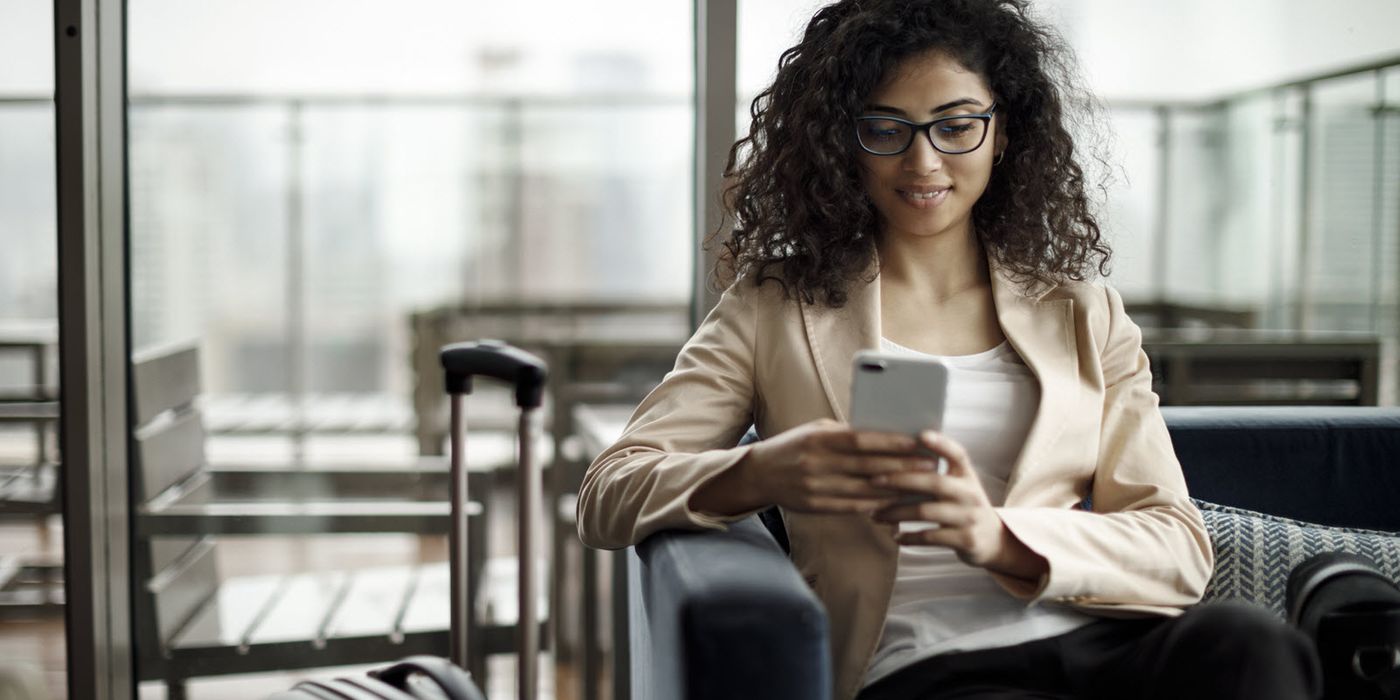 woman booking thanksgiving flight ticket