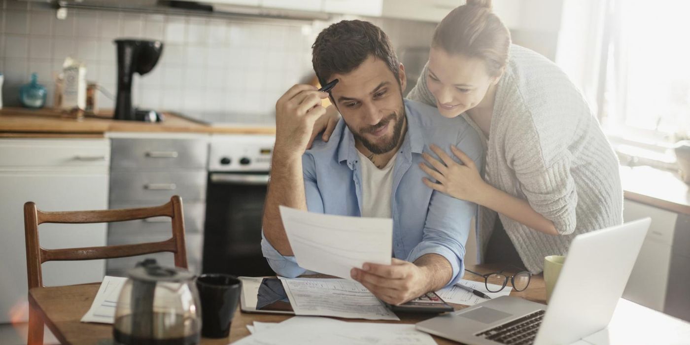 Couple trying to figure out their taxes.