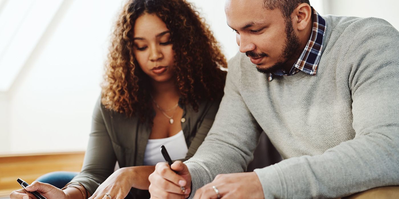 Couple going over their yearly tax checklist