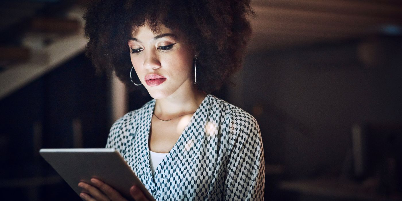 Woman reading Northwestern Mutual Market Commentary