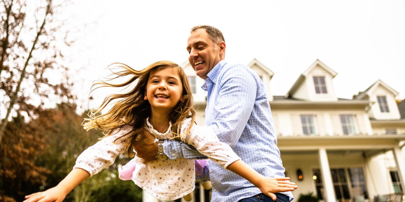 A father and daughter enjoy time together.