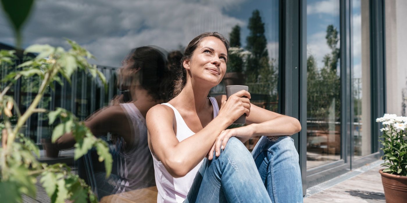 woman thinking about how to save more money in the new year