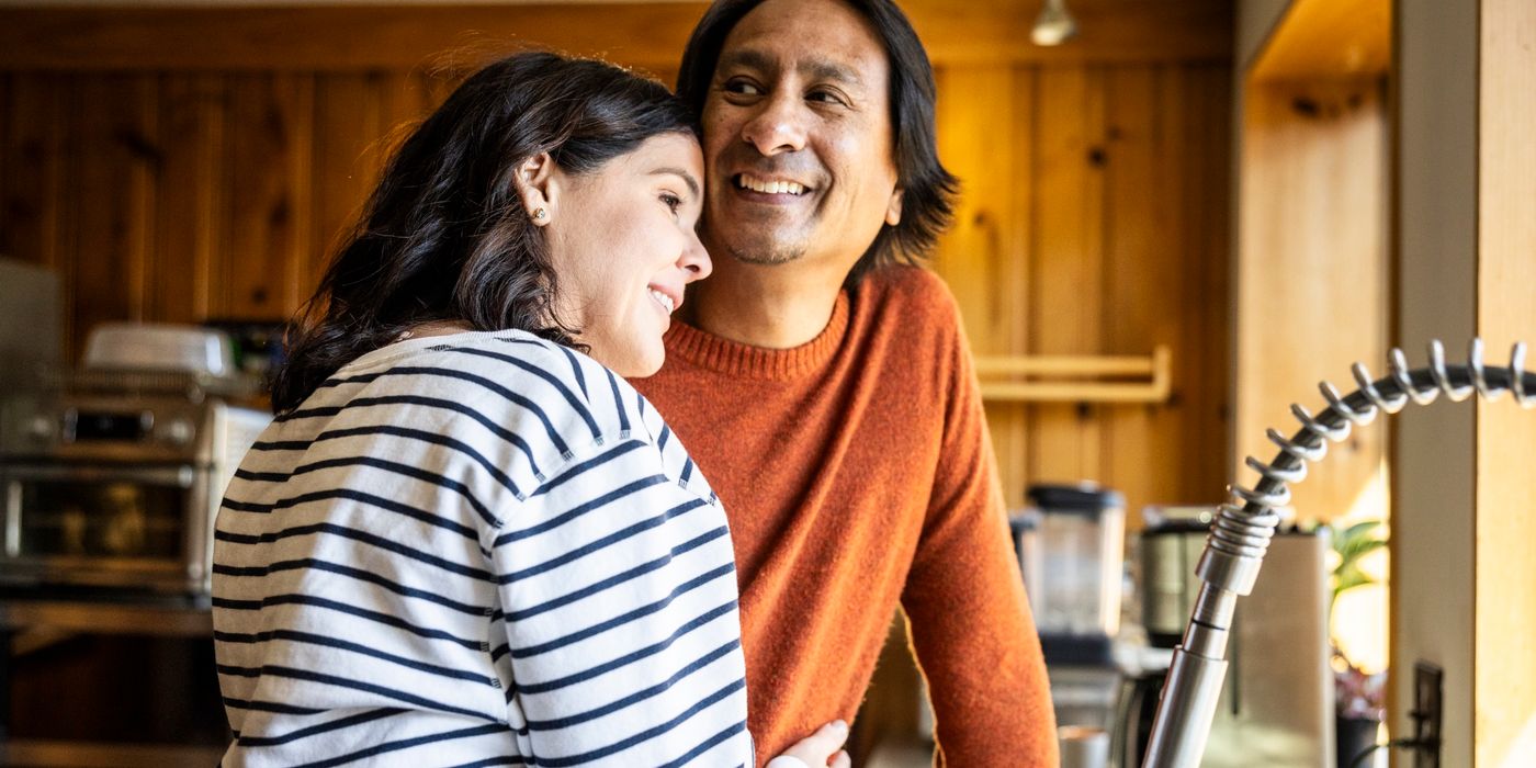 man and woman in kitchen
