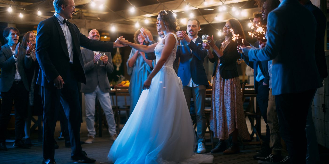 A couple dances in a wedding tent