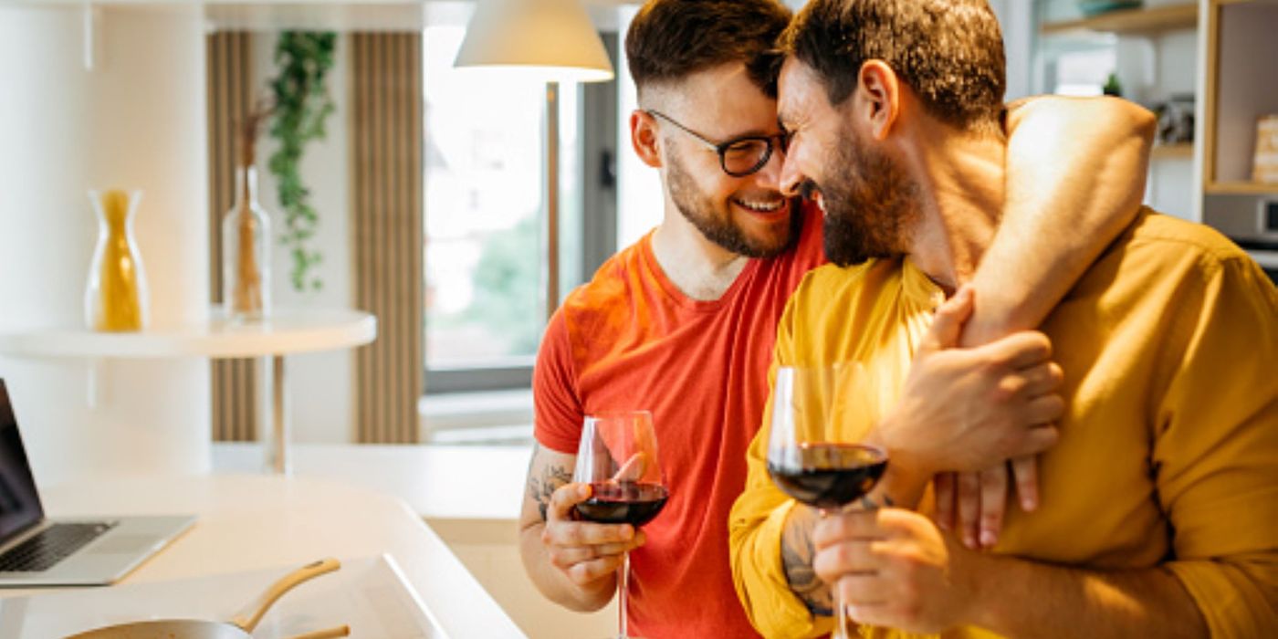 A couple enjoys time together in their kitchen 