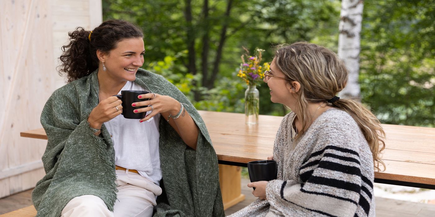 two friends enjoying morning coffee