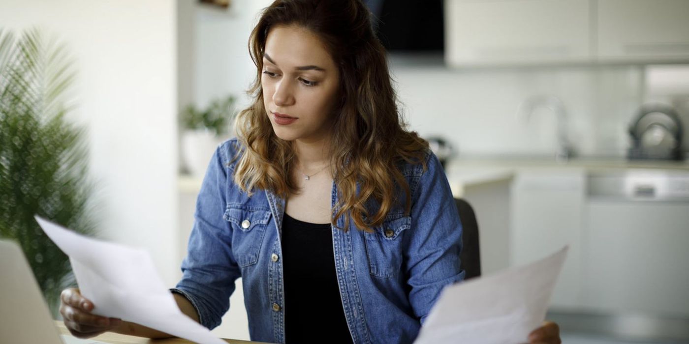 Woman reviewing her investment statements.