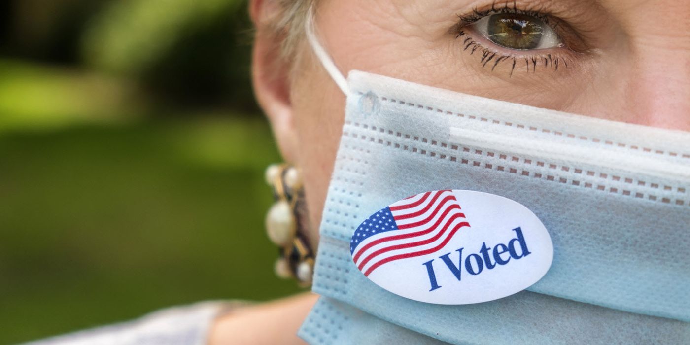 A woman who voted wearing a mask