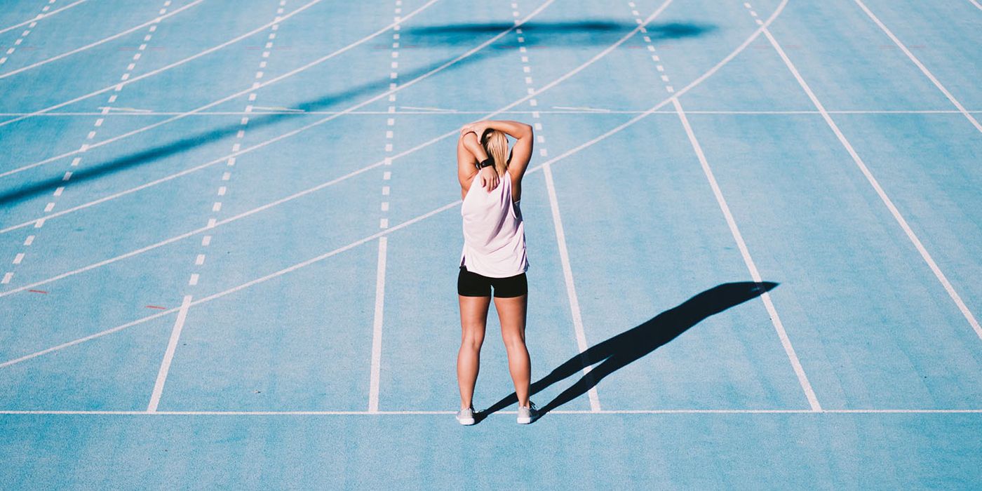 woman warming up on track