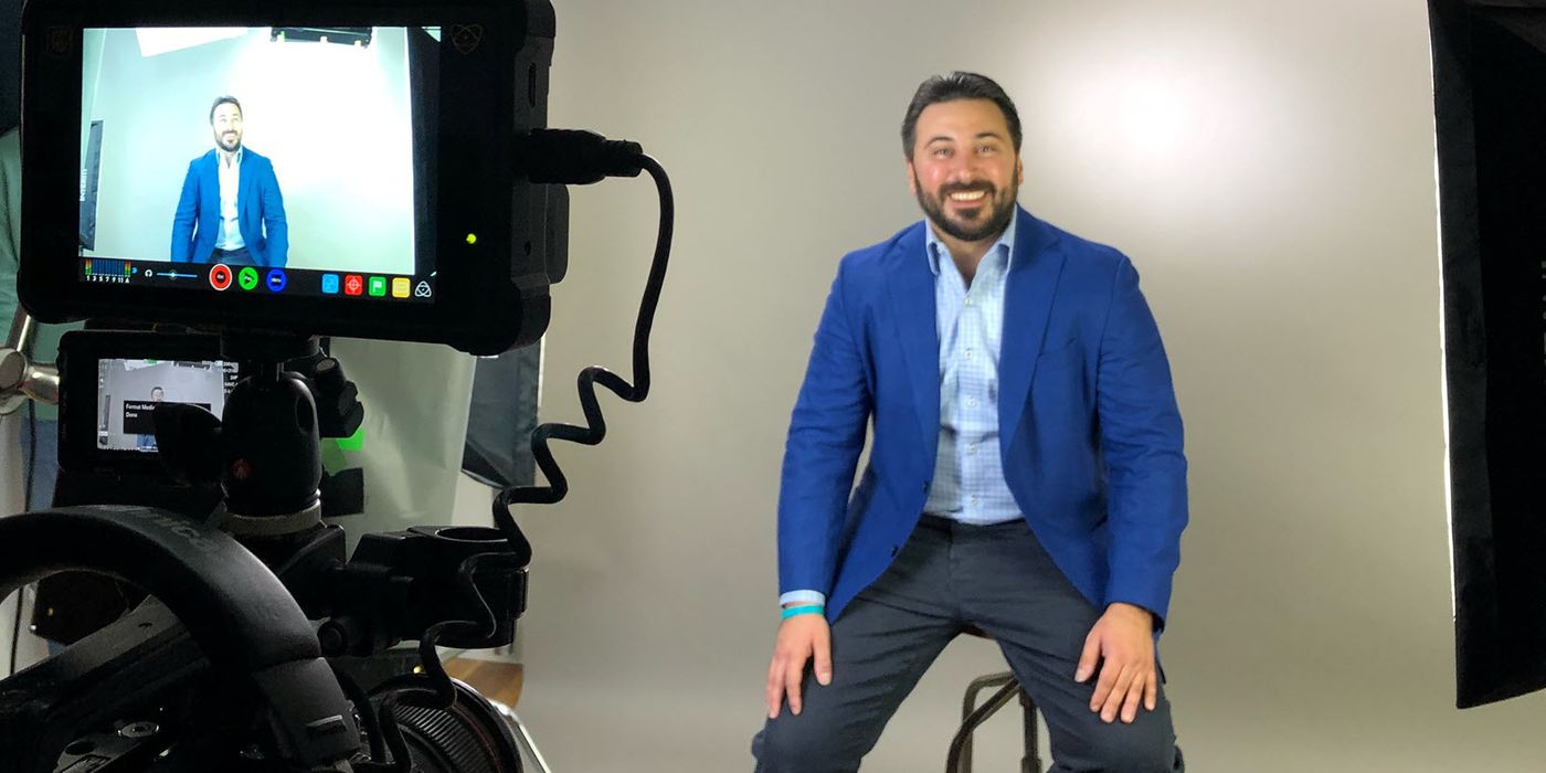 Nema Semnani of Sandler Training poses before a camera