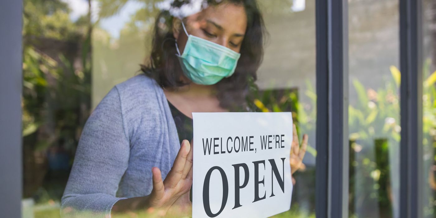 Small business owner reopening store