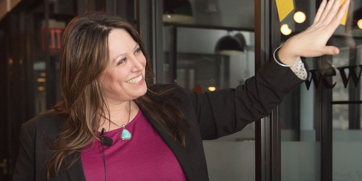 Entrepreneur Erica Wexler arranges post-it notes in her office