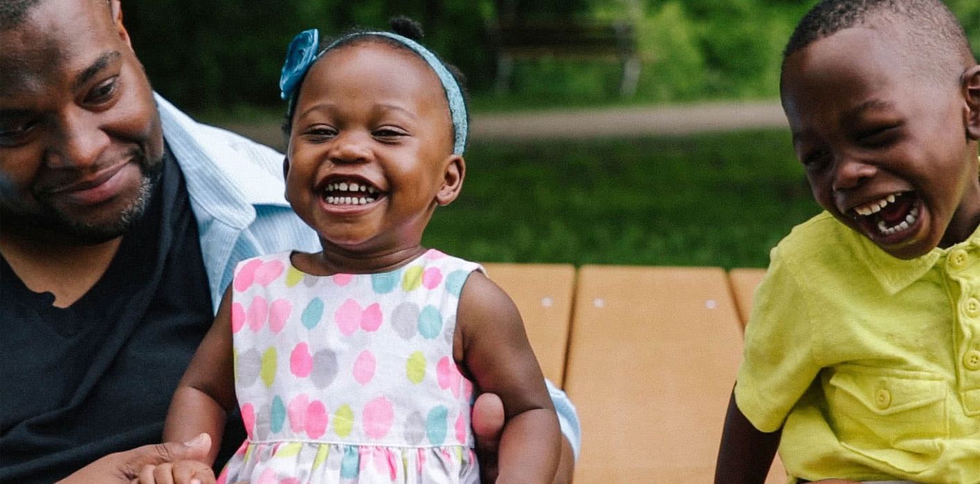 What is permanent life insurance dad outside with his two young kids