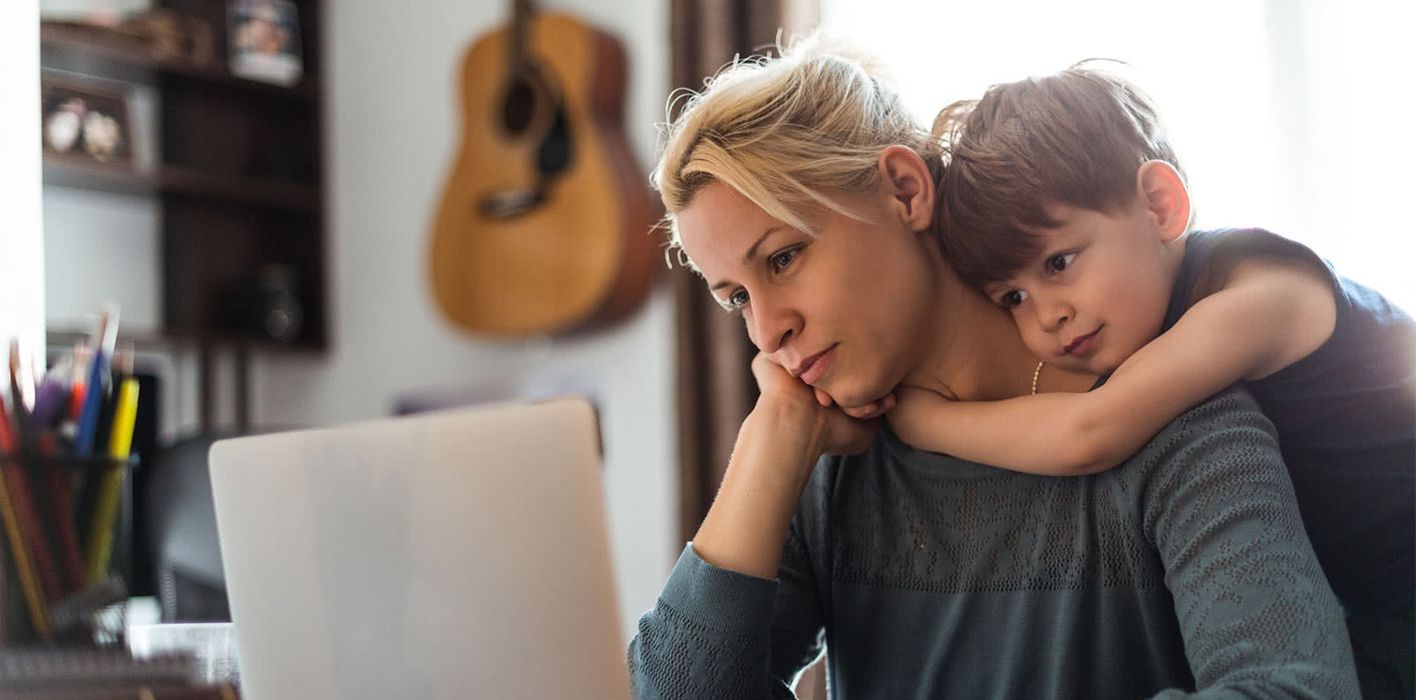 Young family on computer learning the basics of estate planning