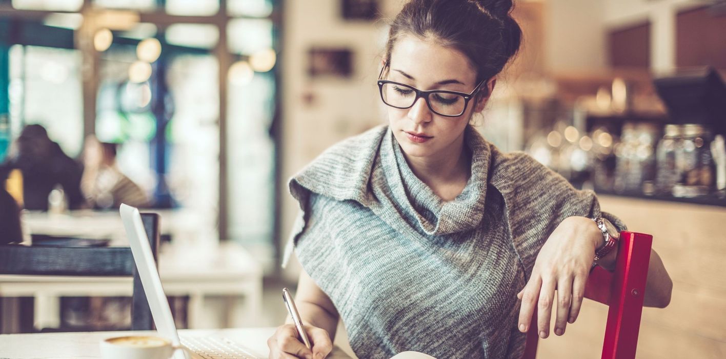 Woman working in a cafe