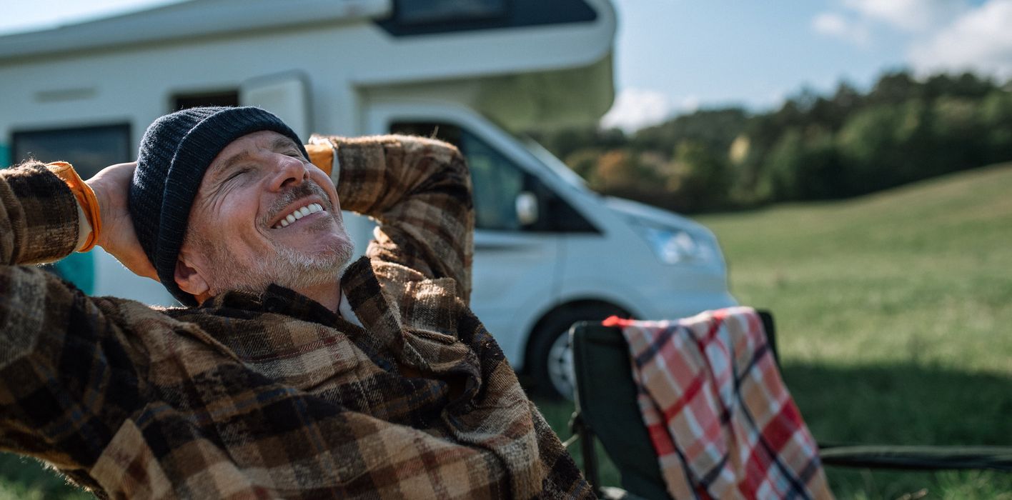 happy-senior-man-camping
