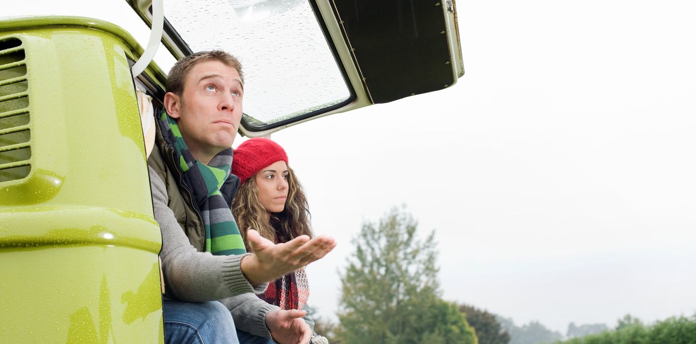 Couple thinking about what they read in the latest weekly market commentary from Northwestern Mutual.