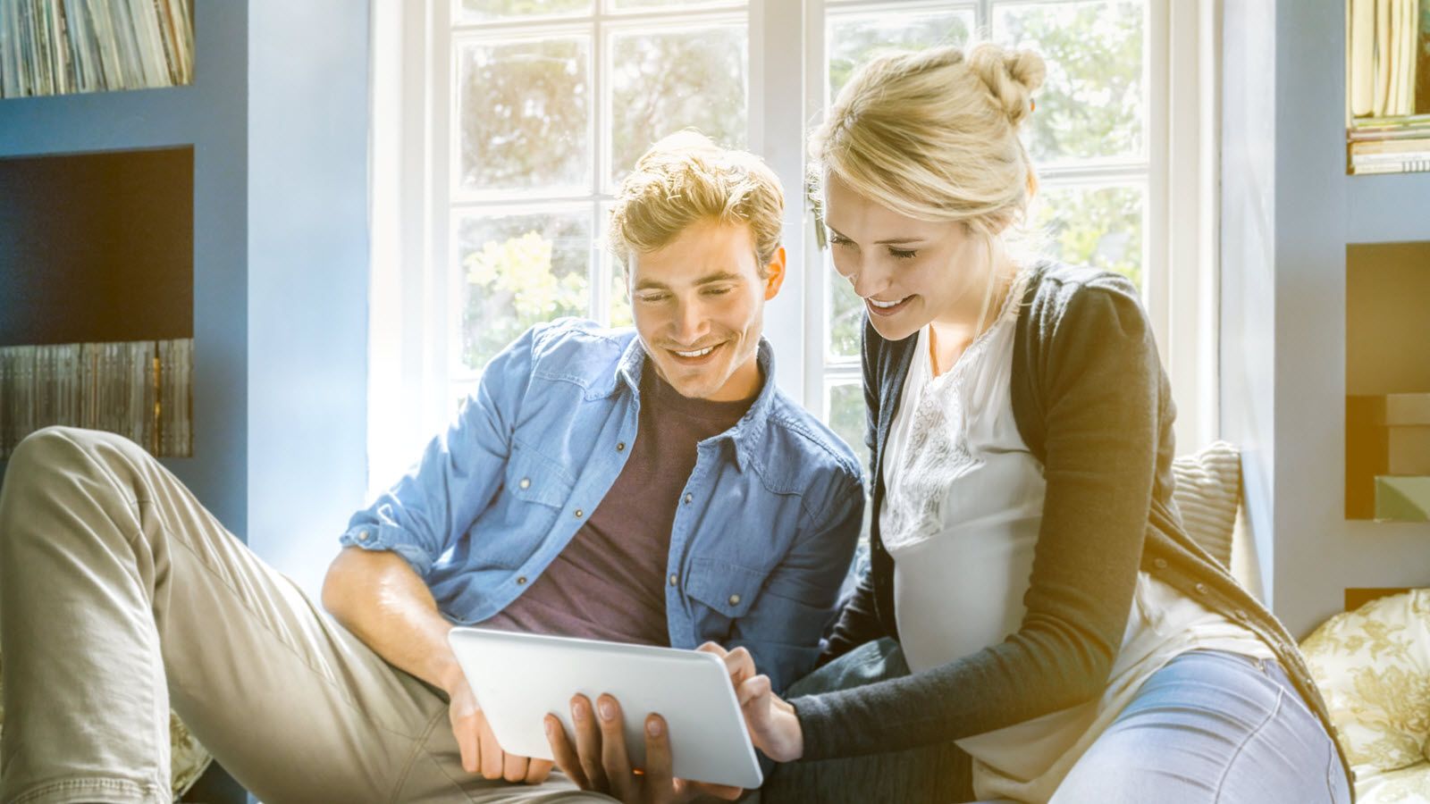 Couple taking a quiz to find out if they’re financially ready for a baby.