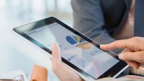 Person on a tablet learning what a 401k account can do