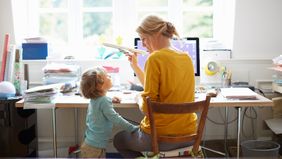 Mom working from home trying to create structure for her kid.