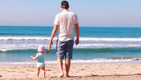 What is a 529 plan dad and toddler on the beach