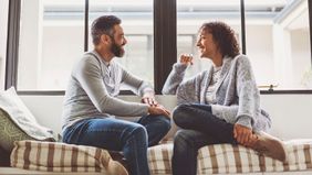 couple discussing what to do with their unspent money