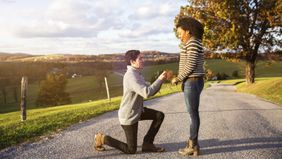 couple getting engaged on outdoor path