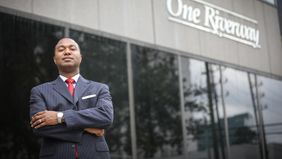 Advisor Mark Haywood in front of office building on how to start a financial plan
