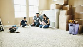 Family moving into a bigger home