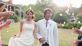 wedding couple holding hands 