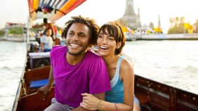 couple on gondola creating travel budget
