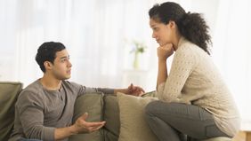 Couple on a couch discussing life insurance for diabetics