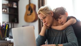 Young family on computer learning the basics of estate planning