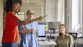 Businesswoman developing succession plan with her advisory team