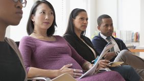 Pregnant woman preparing for maternity leave