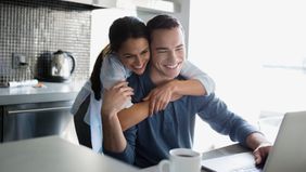 How to get out of debt couple on their computer