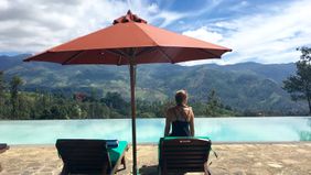 Meesen Brown, pictured in Sri Lanka by an infinity pool.